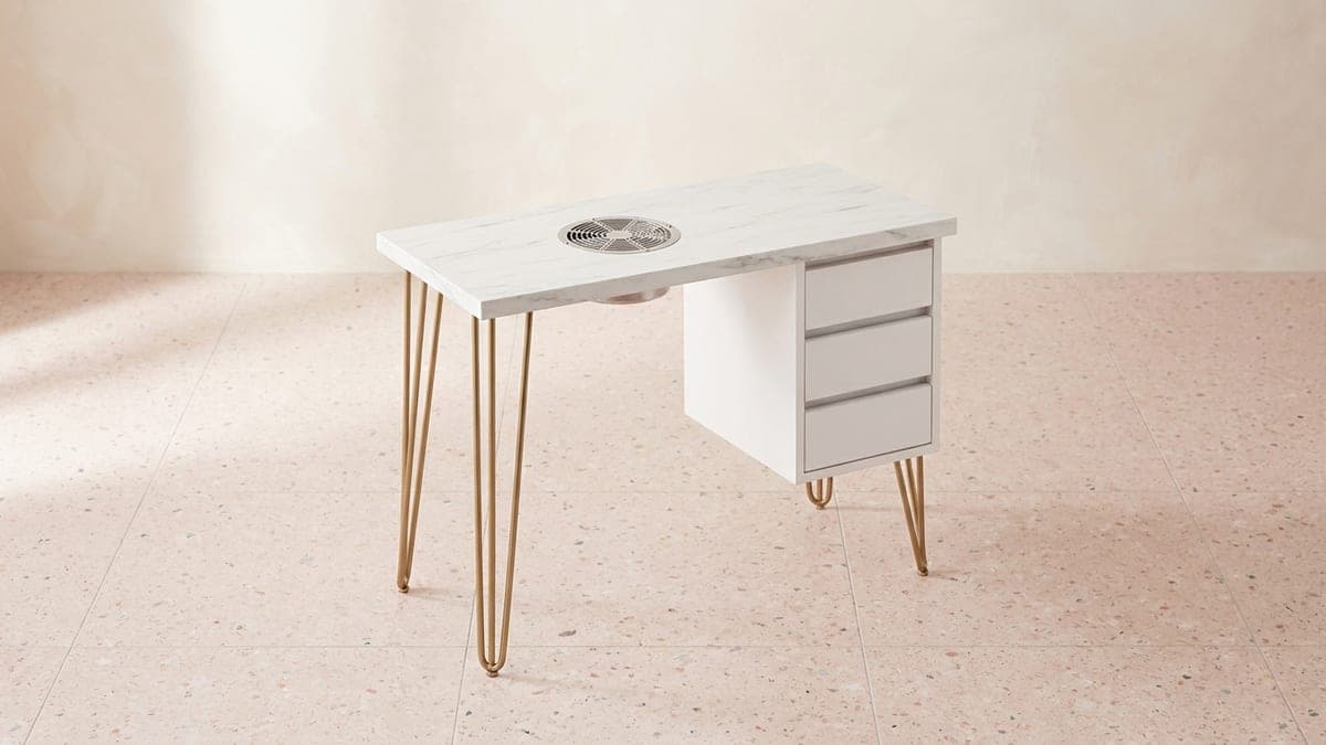 Table de manucure blanche à plateau effet marbre, tiroirs et grille d'aspiration intégrée