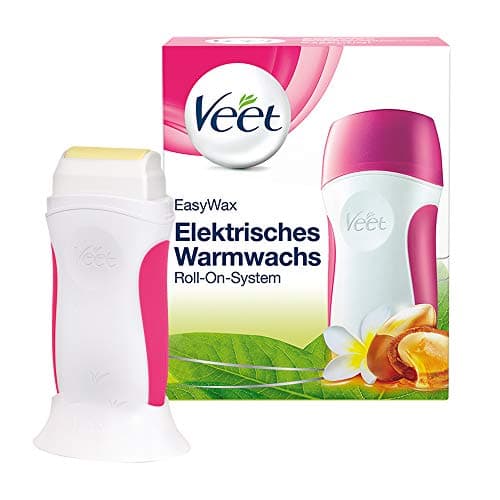 Kit Veet EasyWax rose et blanc : roll-on électrique sur son support, devant sa boîte illustrée d'une fleur de tiaré